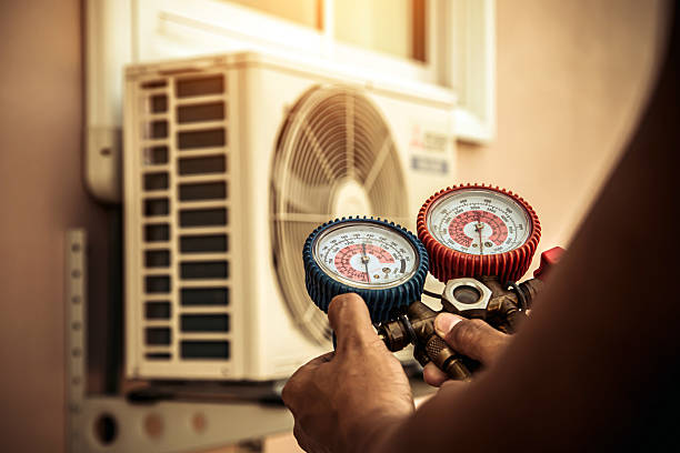 Professional Hvac technician working in Greentown, OH
